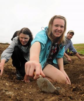 Anne Bruce, Lucy Whitehall and Sam Wilson taking part in the dig